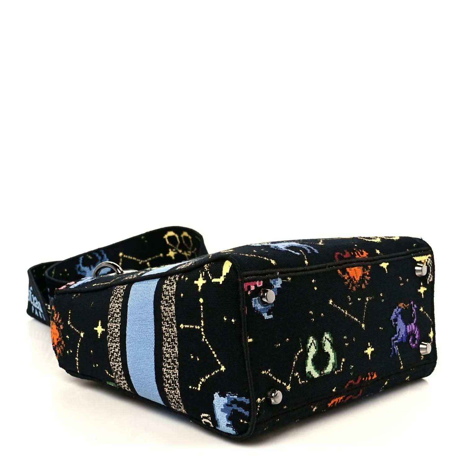 Medium canvas handbag, black with colorful zodiac pixel stars, blue stripe, zip closure