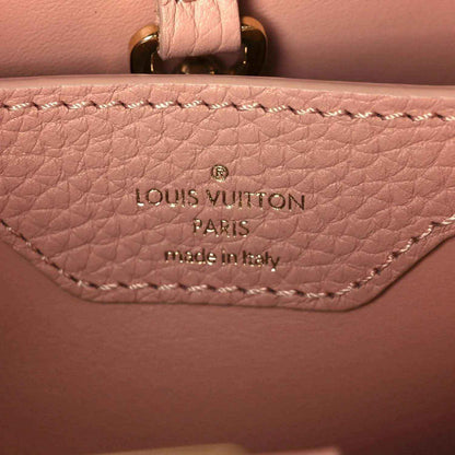 Leather interior stamp reading Louis Vuitton Paris made in Italy