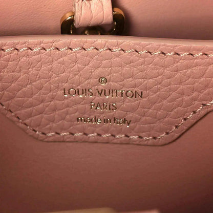Leather interior stamp reading Louis Vuitton Paris made in Italy