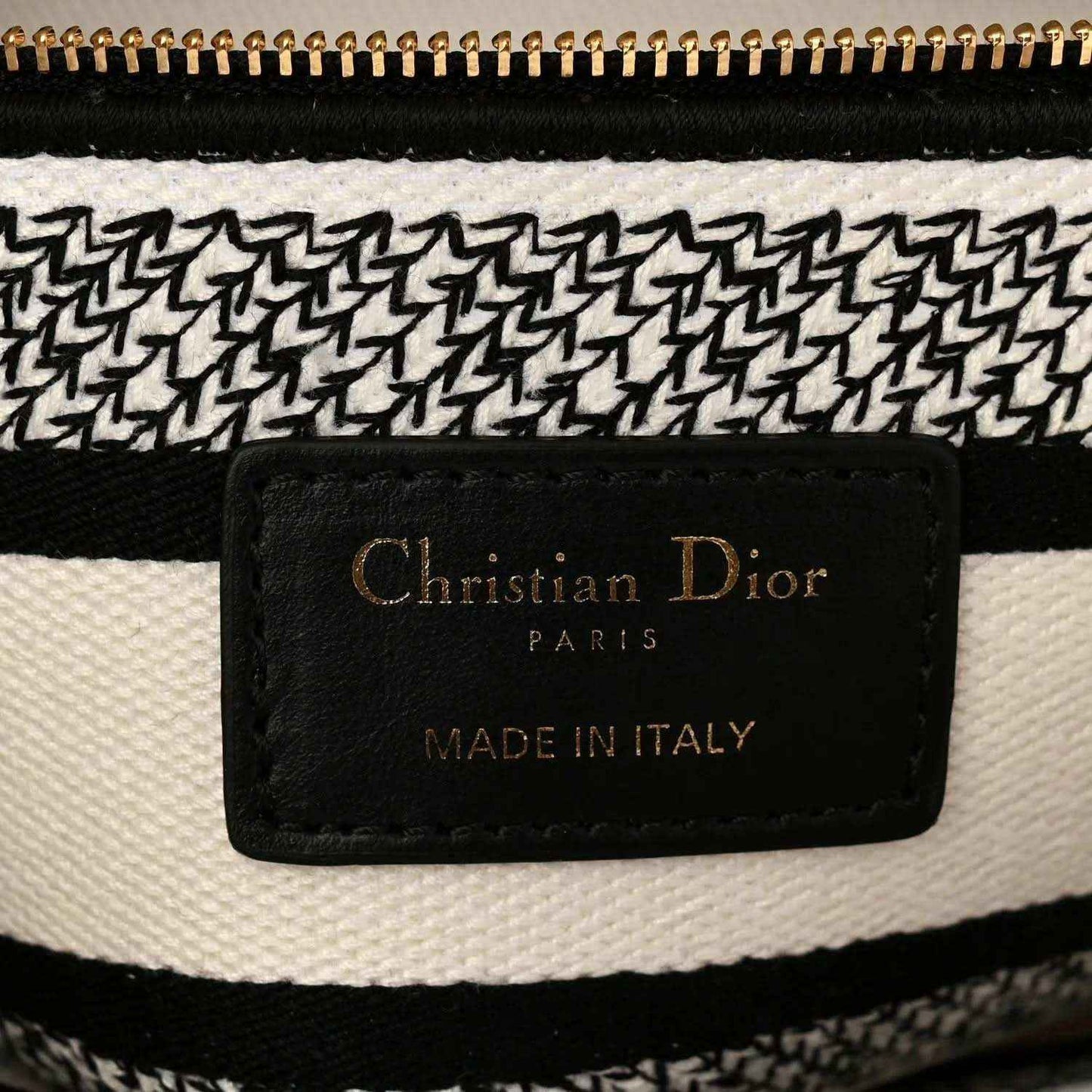 Dioramour bag leather label reading Christian Dior Paris Made in Italy