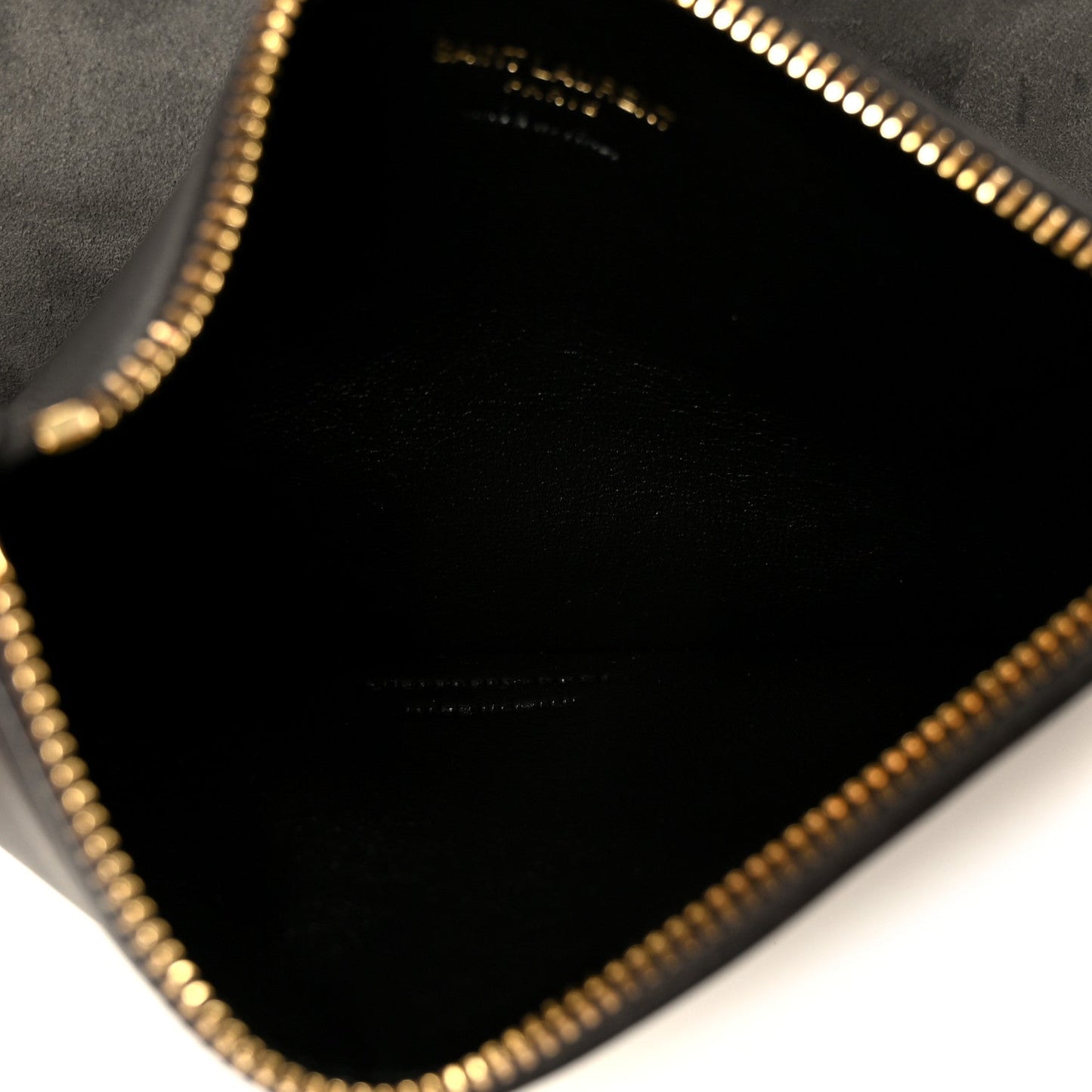 Black fabric-lined interior with gold-tone zipper trim