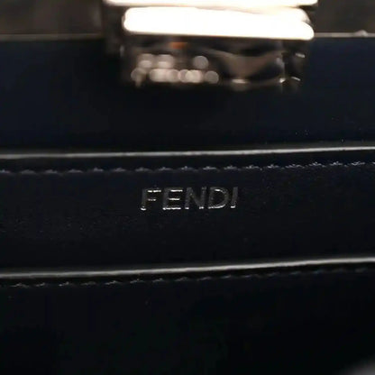 FENDI logo on dark nappa leather satchel, silver-tone rectangular plaque