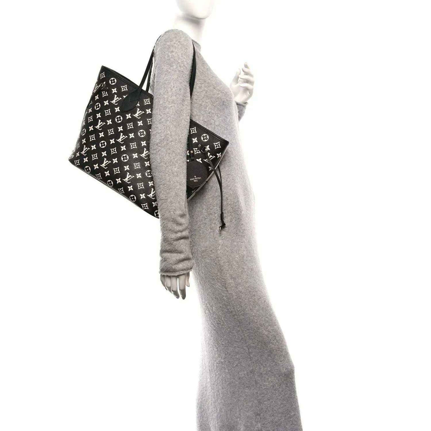 Neverfull MM tote bag in black and white monogram print with sturdy handles