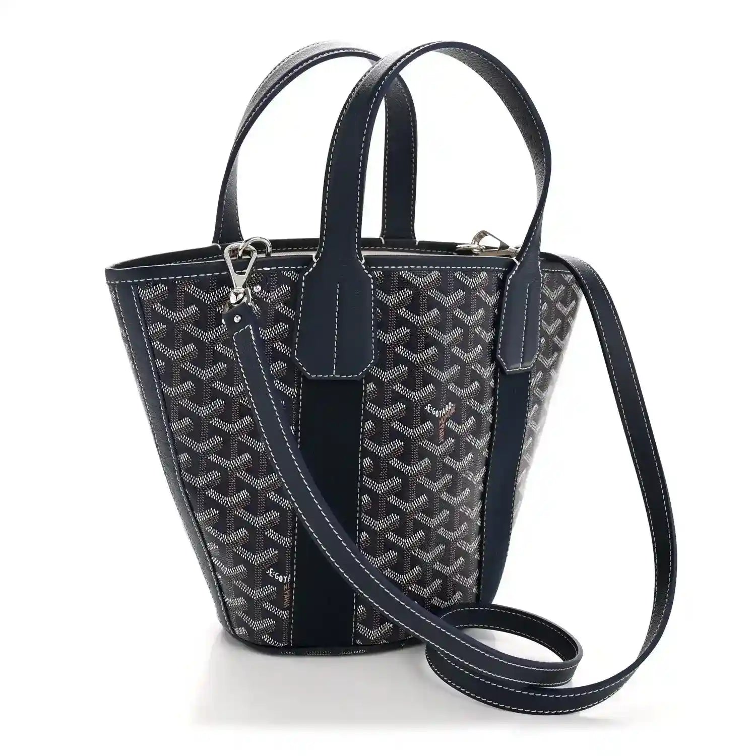 Navy patterned tote bag with top handles and adjustable crossbody strap