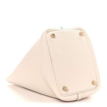 Pale cream textured leather tote base with corner studs and stitched edges