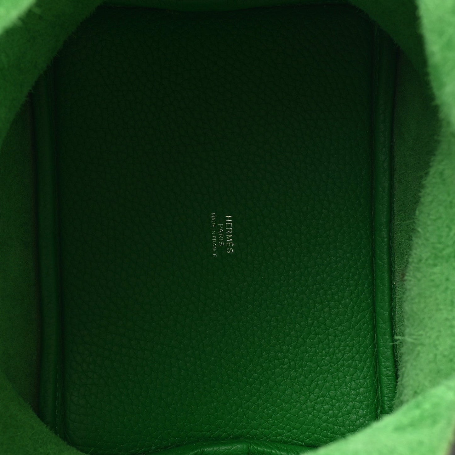 Green leather Picotin Lock 18 PM tote bag interior with Hermes stamp on lining