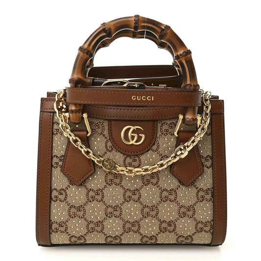Mini tote bag with GG monogram canvas, brown leather trim, bamboo handles, gold-tone chain strap