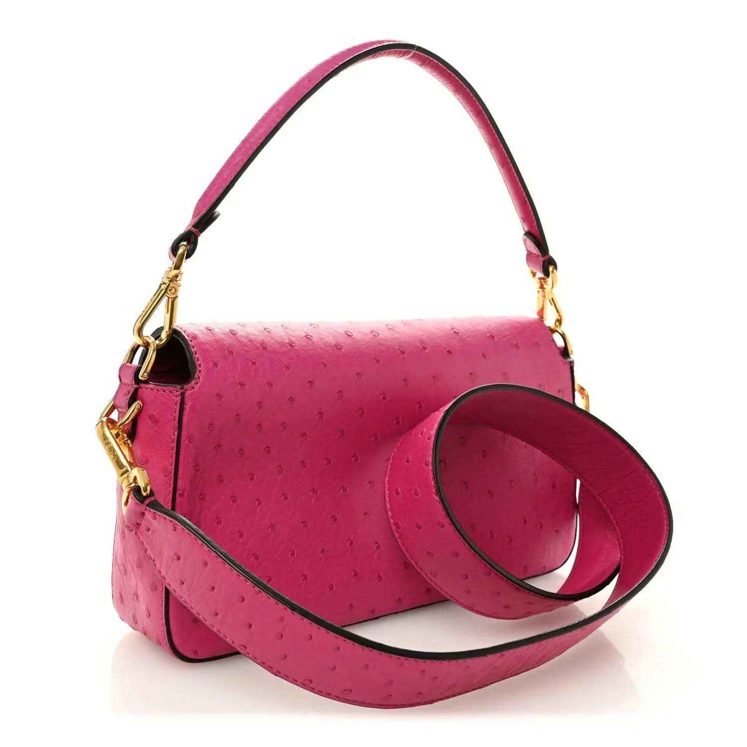 Pink ostrich leather baguette handbag with top handle, shoulder strap, and gold clasp