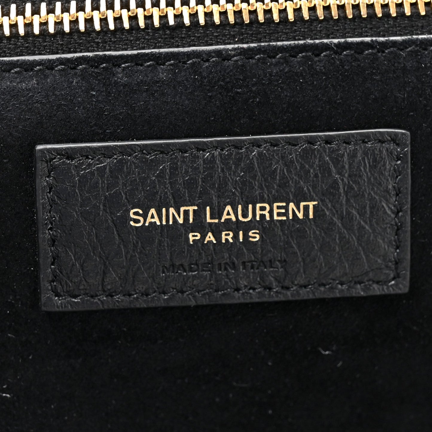 Black leather Bea tote label with gold “SAINT LAURENT PARIS” text