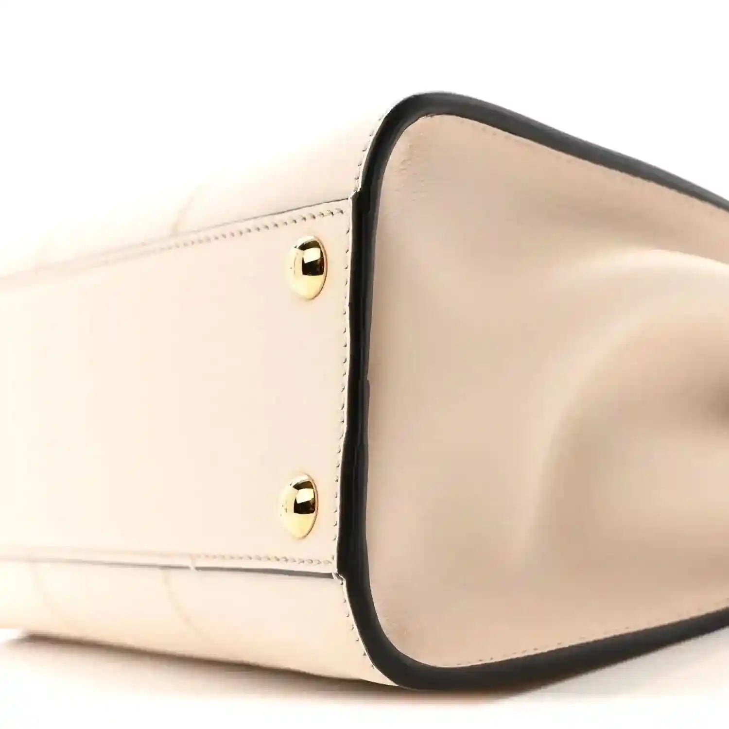 Mini Peekaboo satchel corner close-up in cream leather with dark edge trim