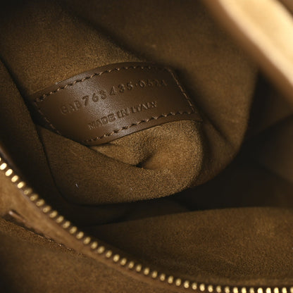 Suede tote bag interior stamp and gold zipper track, golden-brown suede
