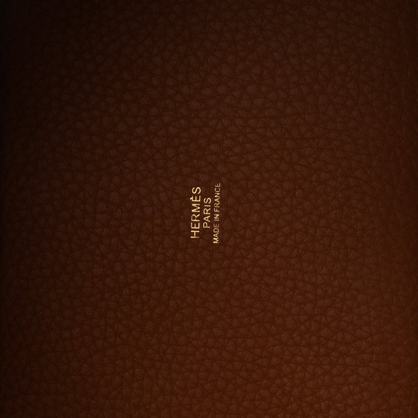 Hermès leather bucket bag lining with embossed logo and Made in France text