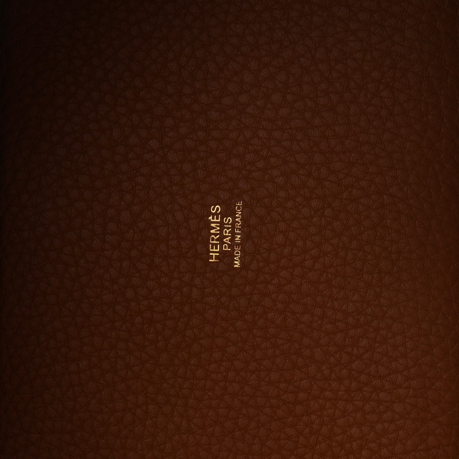 Hermès leather bucket bag lining with embossed logo and Made in France text