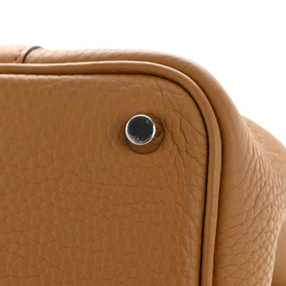 Biscuit brown leather bucket bag snap button and rounded corner