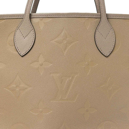 Louis Vuitton Neverfull MM tote bag close-up of top handles and embossed monogram