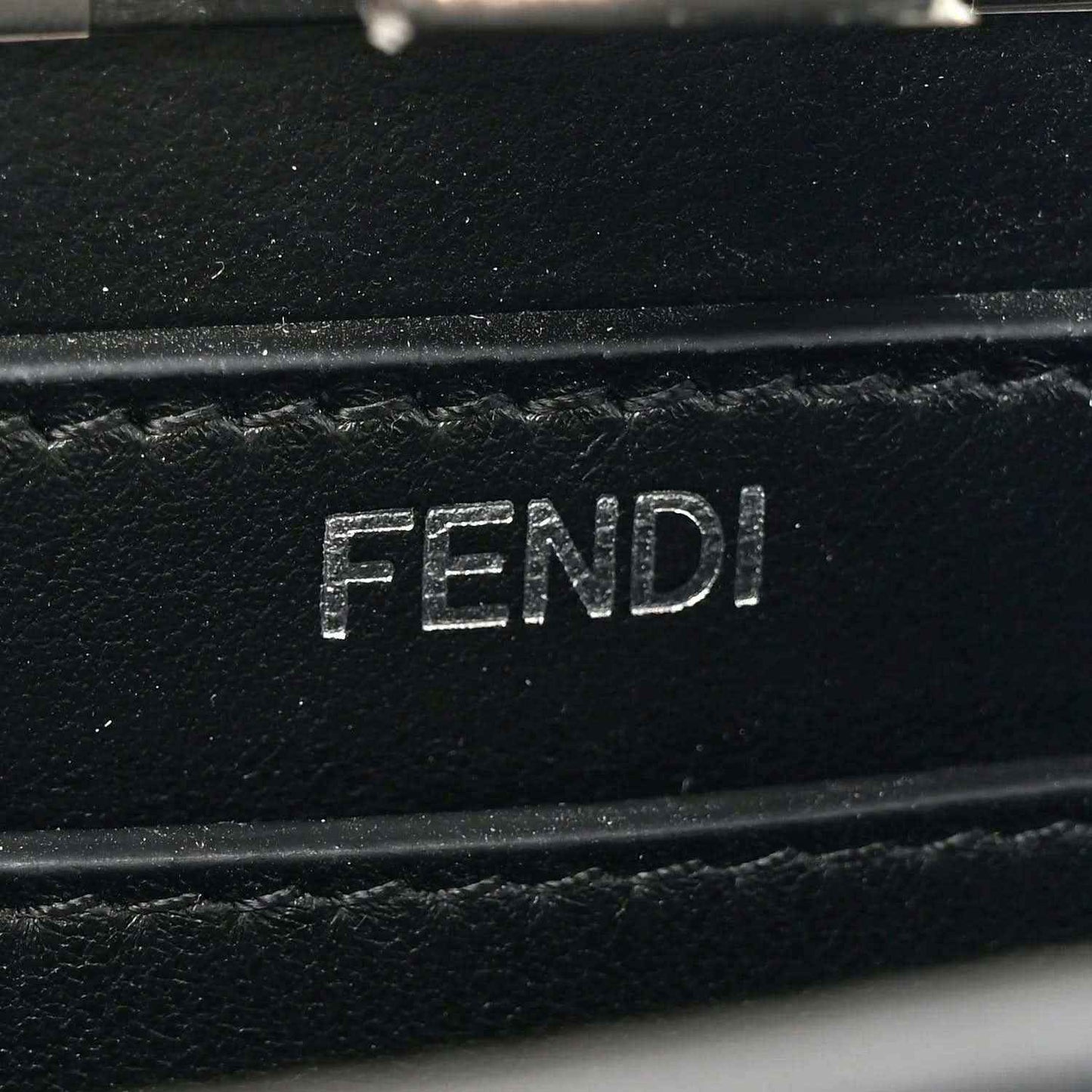 Fendi black leather interior with FENDI logo stamp