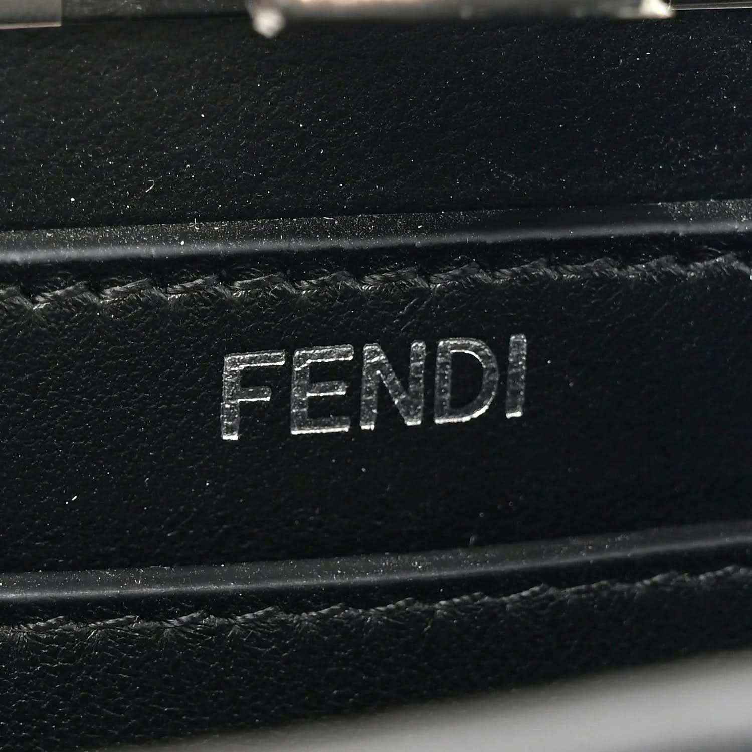 Fendi black leather interior with FENDI logo stamp