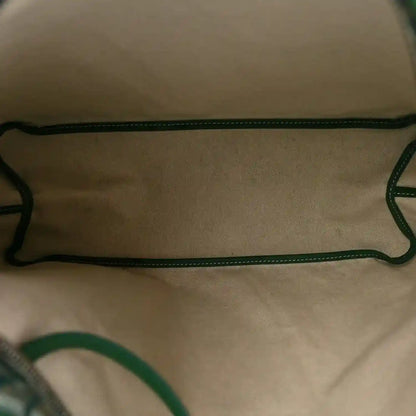 Green interior lining with matching straps and stitched trim