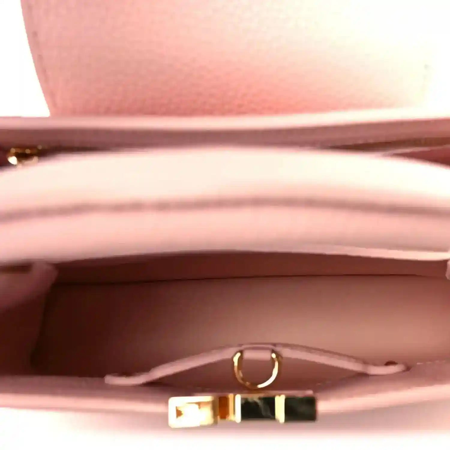 Louis Vuitton Capucines BB shoulder bag interior with pink lining and gold clasp hardware