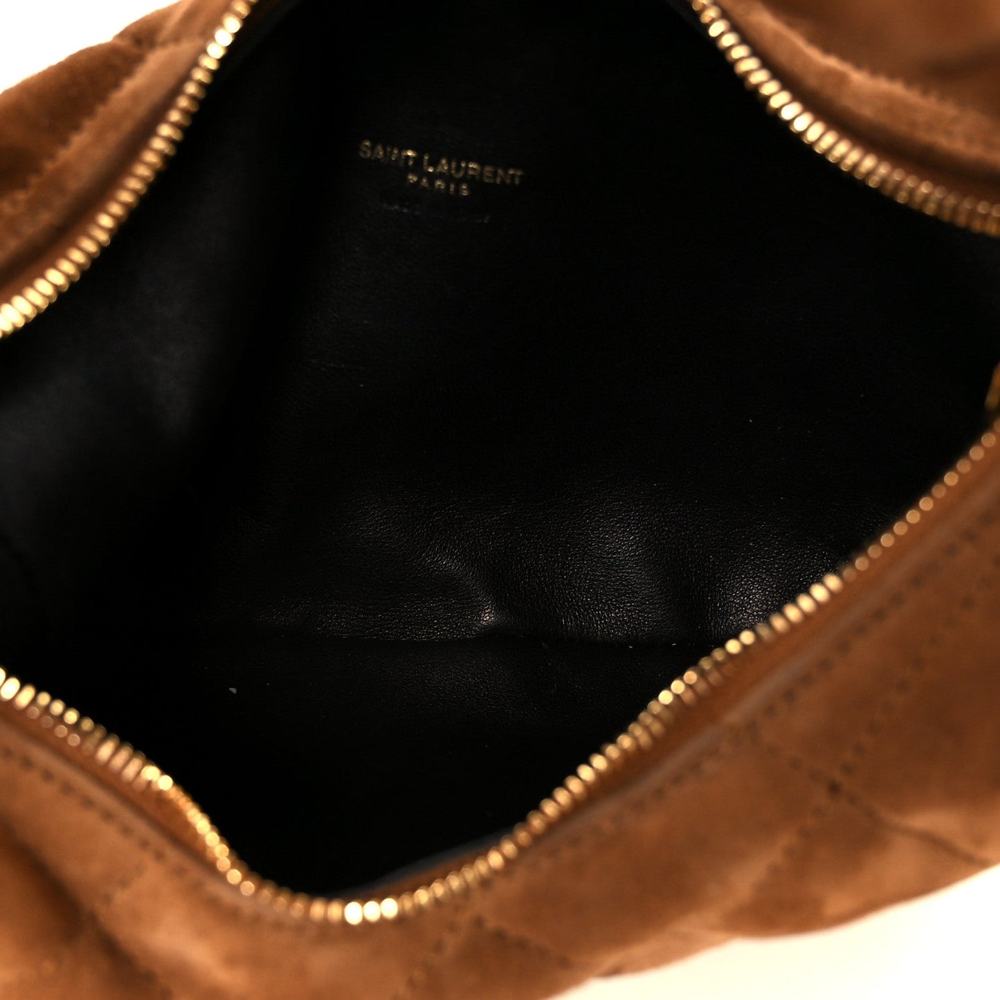 Suede tote bag interior lining with zipper trim along the opening