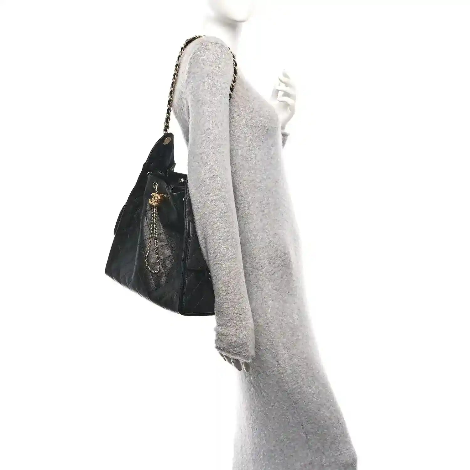 Black Chanel drawstring handbag with chain strap and CC logo hardware