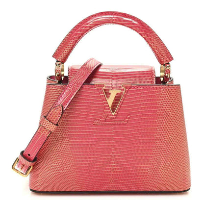 Louis Vuitton mini handbag, fuchsia textured lizard, gold V clasp, top handles.