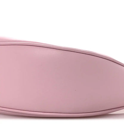 Celine smooth calfskin medium shoulder bag in pastel pink, curved side profile