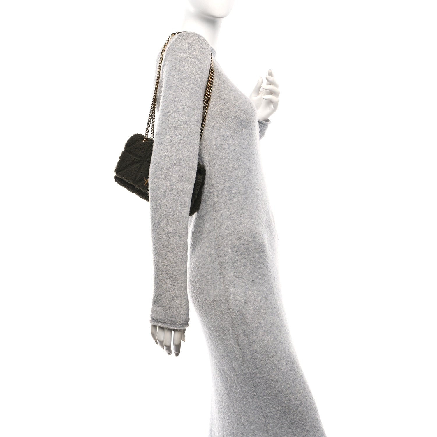Dark shearling shoulder bag with gold chain strap, side profile