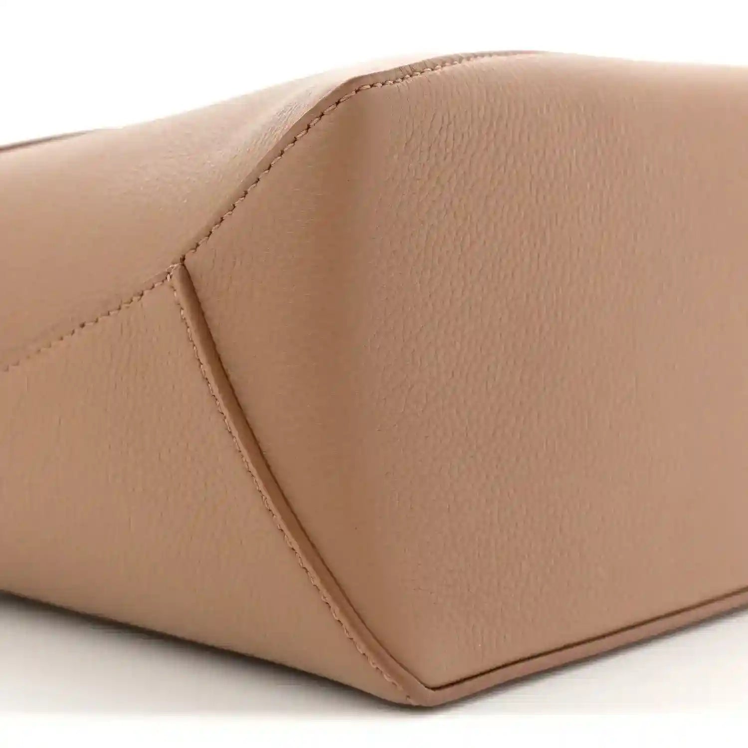 Toffee grained leather bag corner with contrast stitching