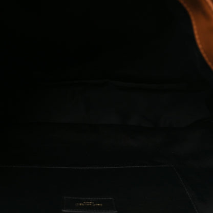 Leather-lined interior with small rectangular brand label.