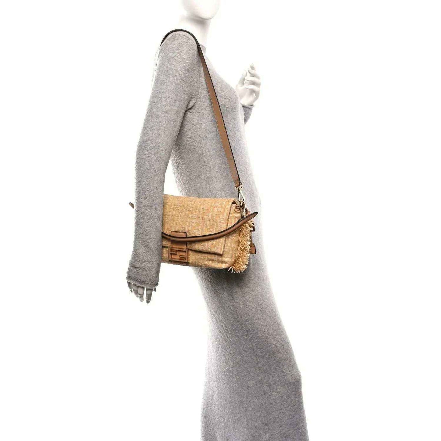 Fendi Mamma Baguette handbag side view in beige raffia jacquard with fringe tassels