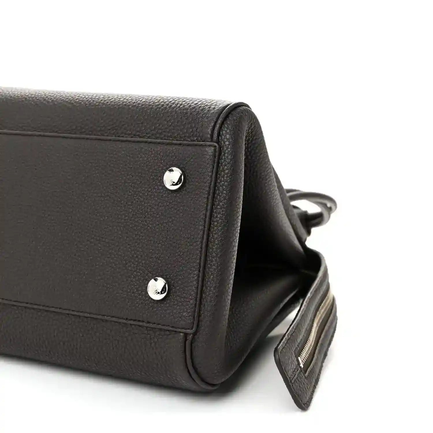 Dark leather Loewe Madrid bag side with silver studs and adjustable strap