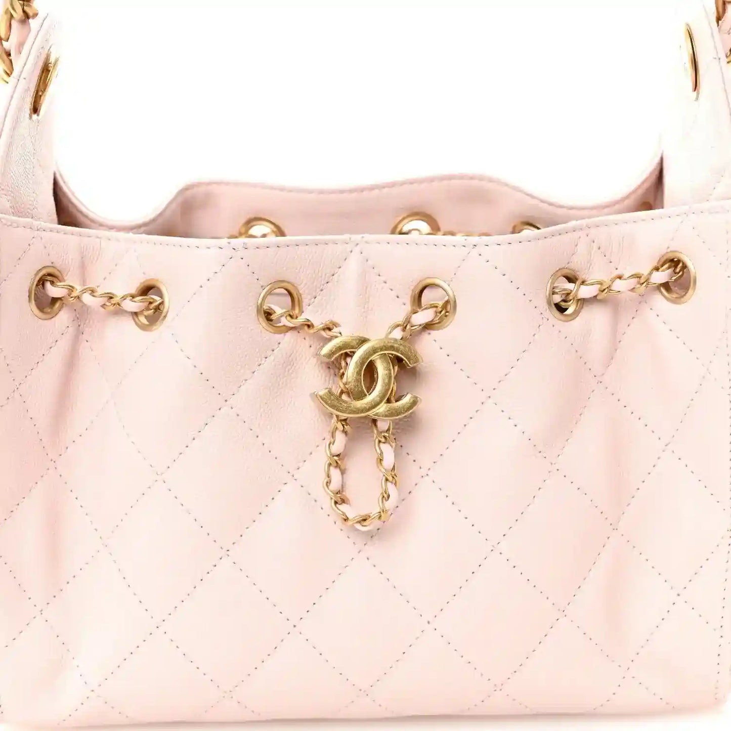 Light pink Chanel mini quilted leather handbag front with chain and dangling clasp