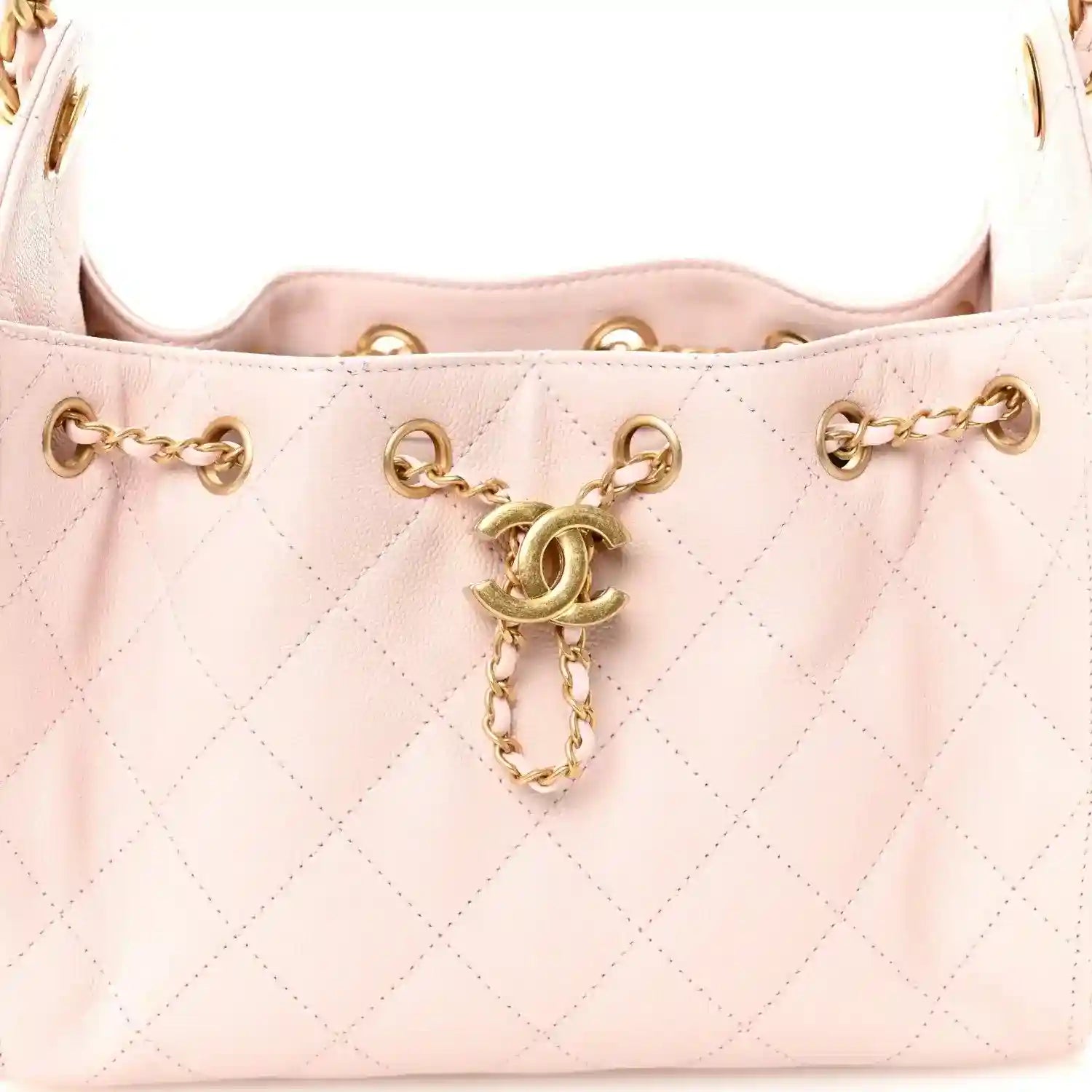 Light pink Chanel mini quilted leather handbag front with chain and dangling clasp