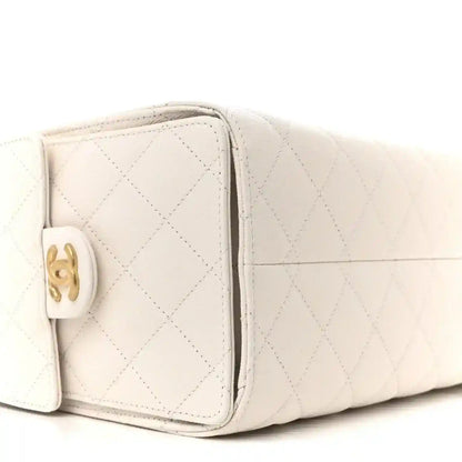 White quilted caviar leather mini handbag with gold-tone turn-lock clasp