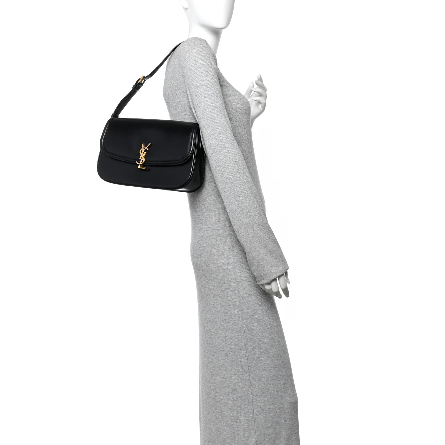 Saint Laurent black leather shoulder bag with gold YSL monogram on a model