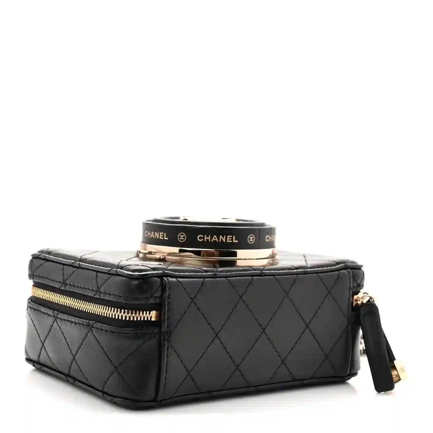 Black quilted lambskin mini bag with top clasp hardware and gold-tone zipper