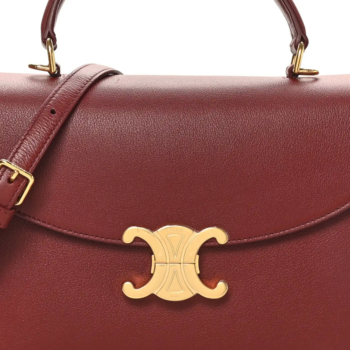 Celine burgundy grained leather shoulder bag front with gold logo emblem and strap