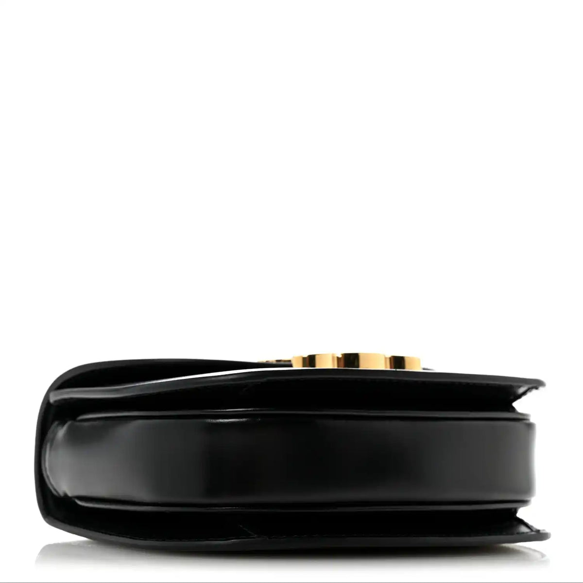 Black mini crossbody bag, side view with smooth leather and gold-tone edge detail