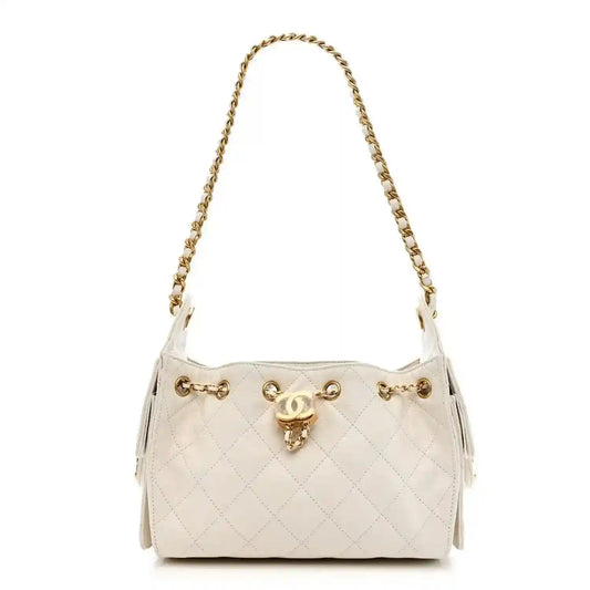 White quilted leather mini handbag with gold-tone chain strap and turn-lock closure