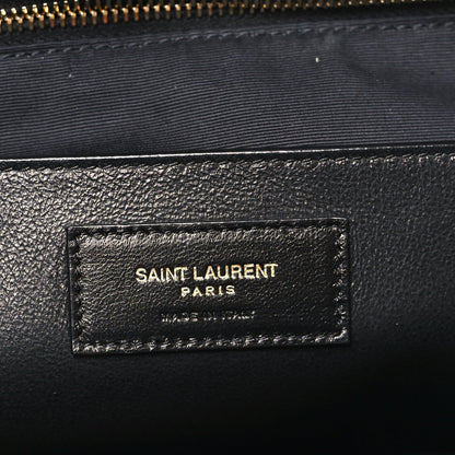 Saint Laurent Paris logo label on black lambskin lining near zipper