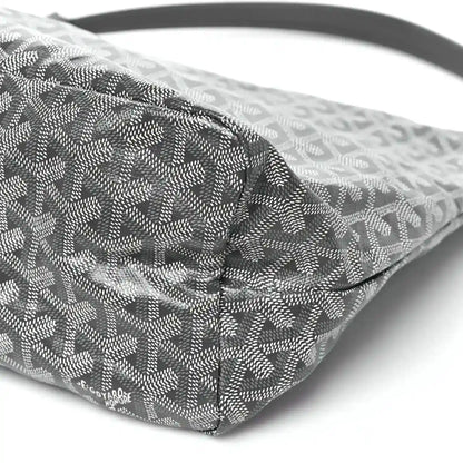 Grey coated canvas hobo bag base corner with repeating pattern and stitching