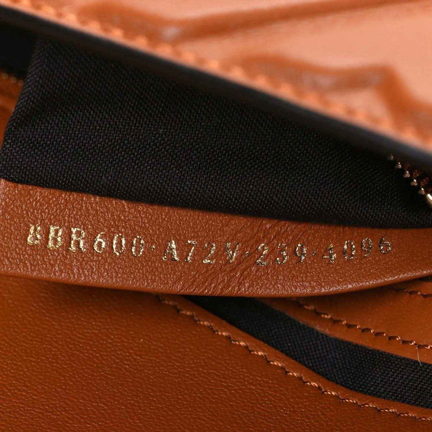 Fendi baguette bag interior strap and leather stitching with serial-style imprint