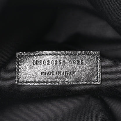 Leather interior label with style code and Made in Italy, close-up