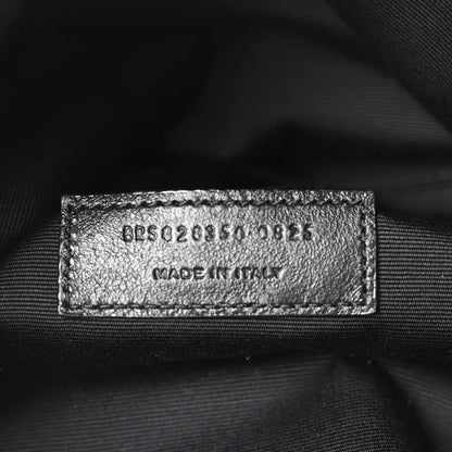 Leather interior label with style code and Made in Italy, close-up