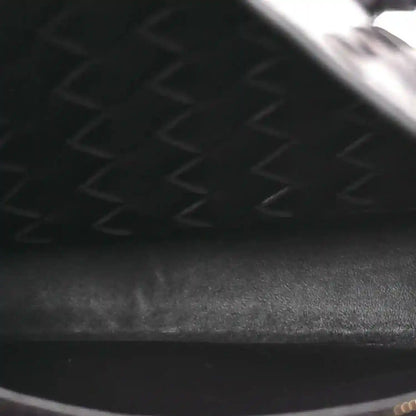 Intrecciato leather bag interior lining with zipper track and seam