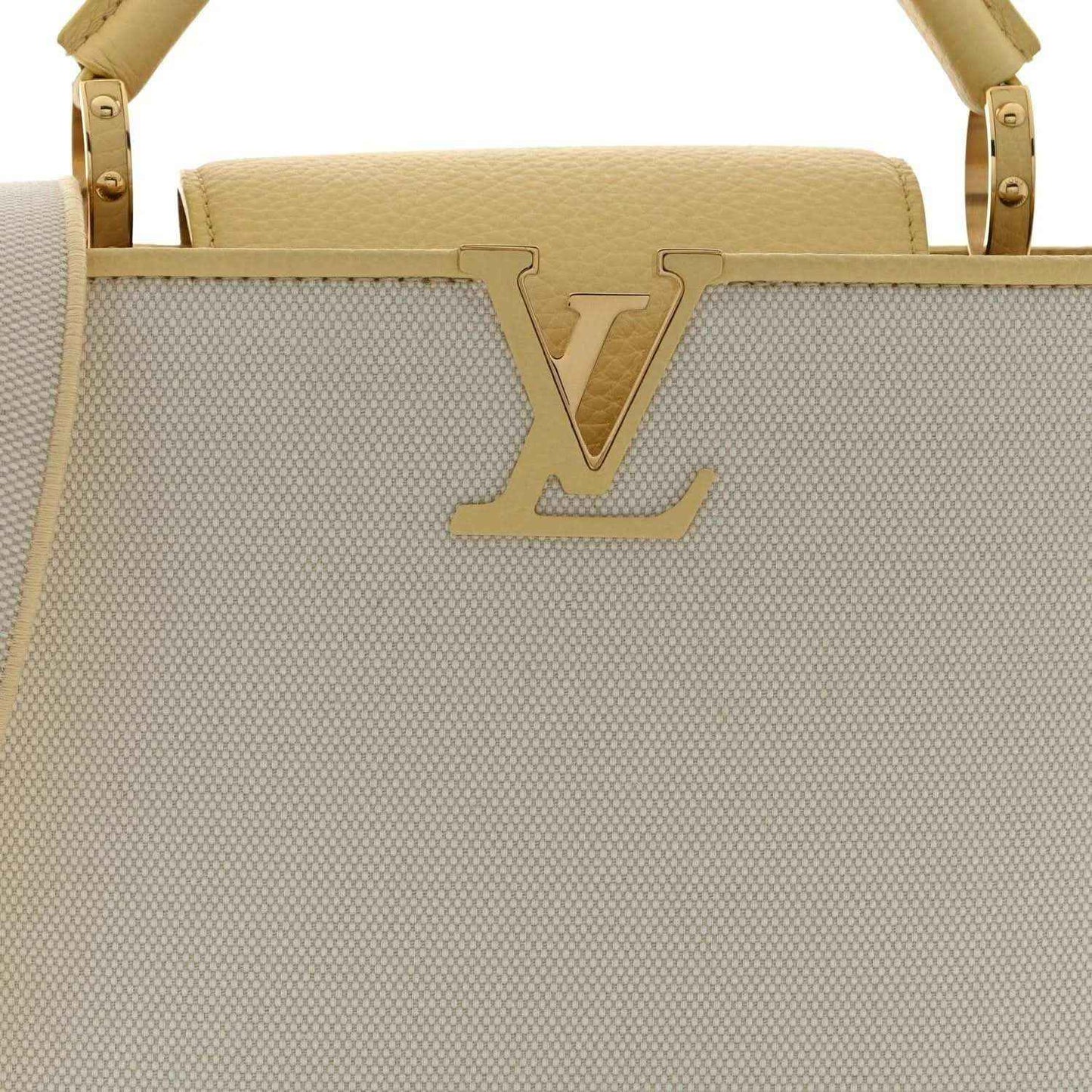 Louis Vuitton Capucines BB handbag front view with large LV emblem on light canvas