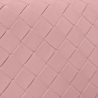 Rose pink nappa intrecciato clutch close-up with woven leather pattern