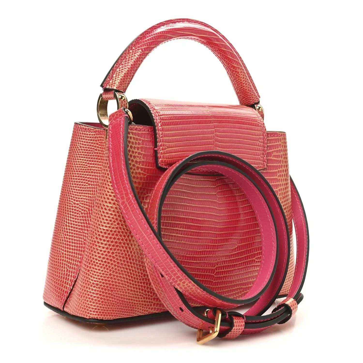 Louis Vuitton mini handbag, fuchsia textured lizard, shoulder strap and gold rings.