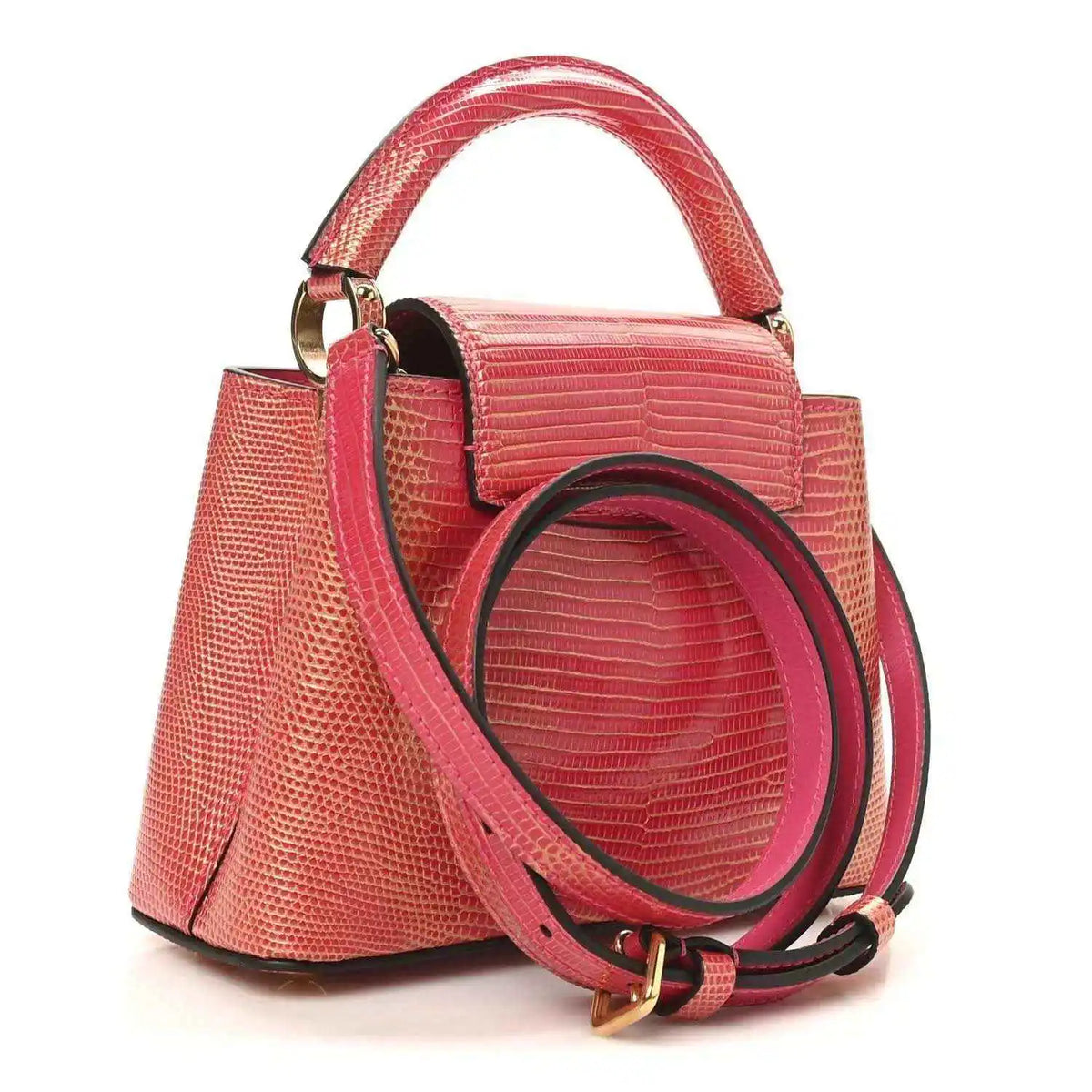 Louis Vuitton mini handbag, fuchsia textured lizard, shoulder strap and gold rings.